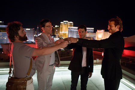 (L-R) Alan (ZACH GALIFIANAKIS), Stu (ED HELMS), Doug (JUSTIN BARTHA) and Phil (BRADLEY COOPER) in THE HANGOVER, a Warner Bros. Pictures release.  Photo by Frank Masi.